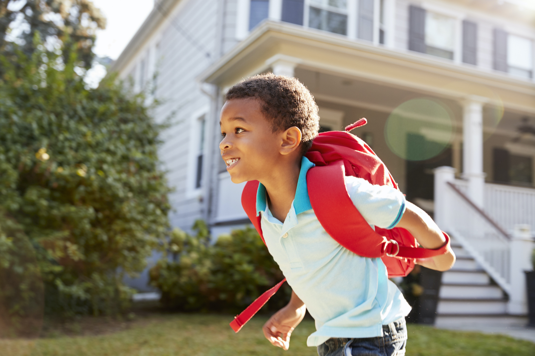 Young Boy Walking to School