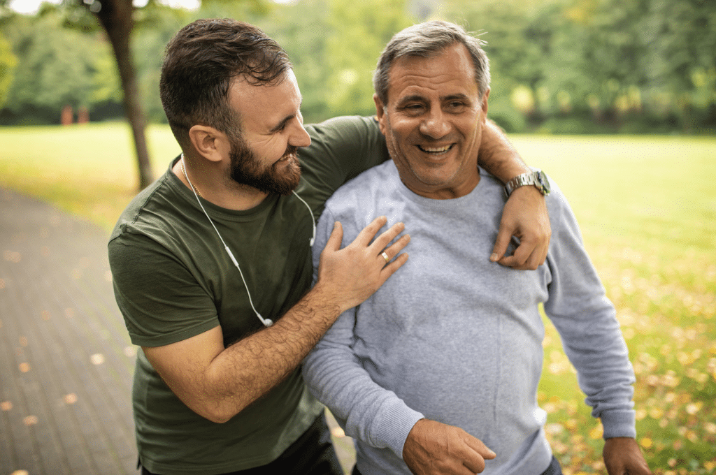 Father and son walking outside