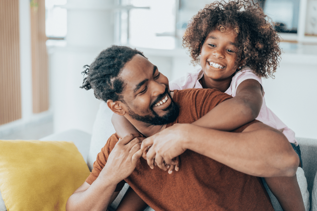 Father and daughter in home