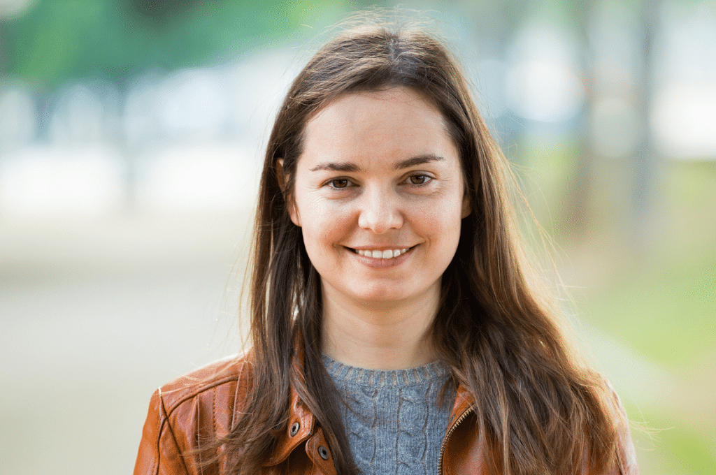 Woman smiling outside