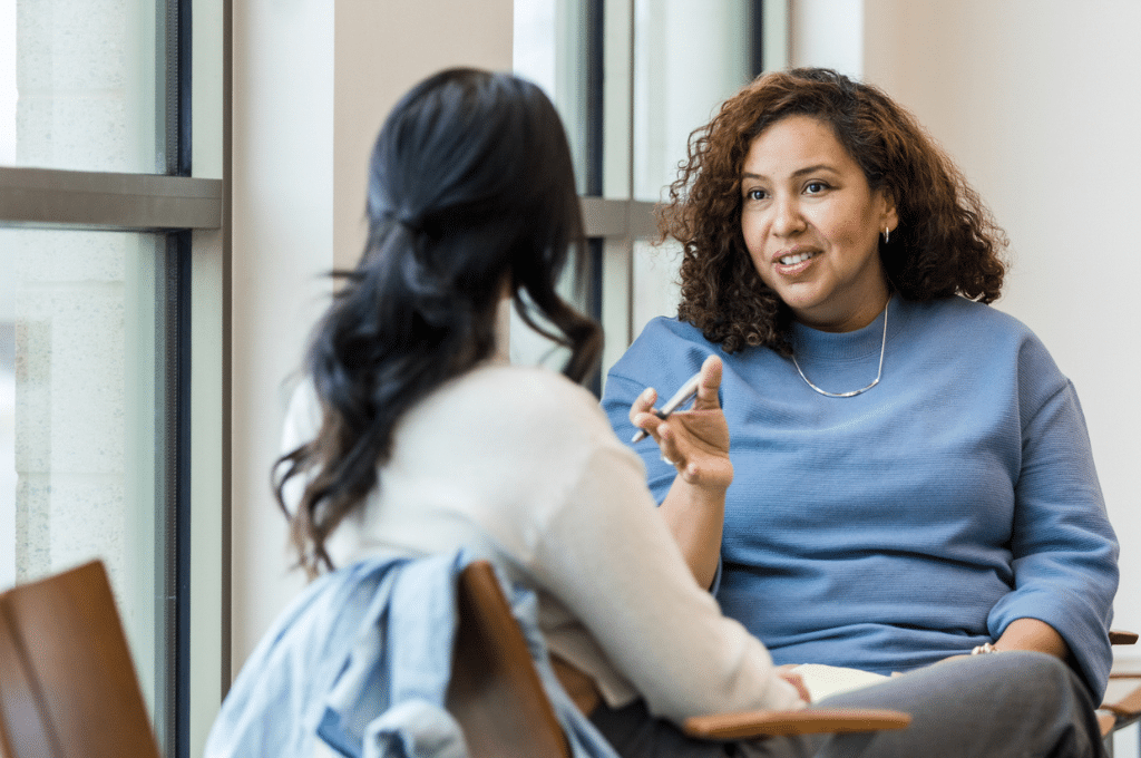 Employer talking to their employee