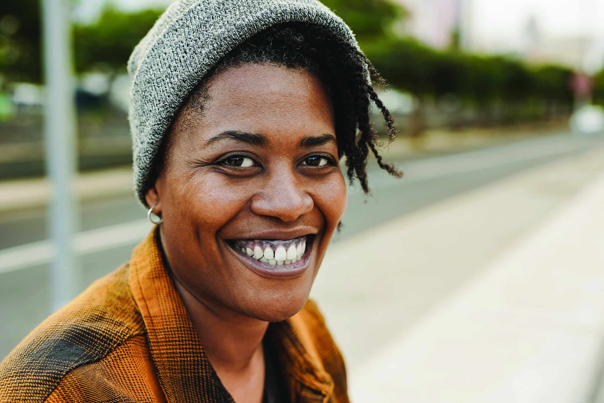 Young African American individual smiling