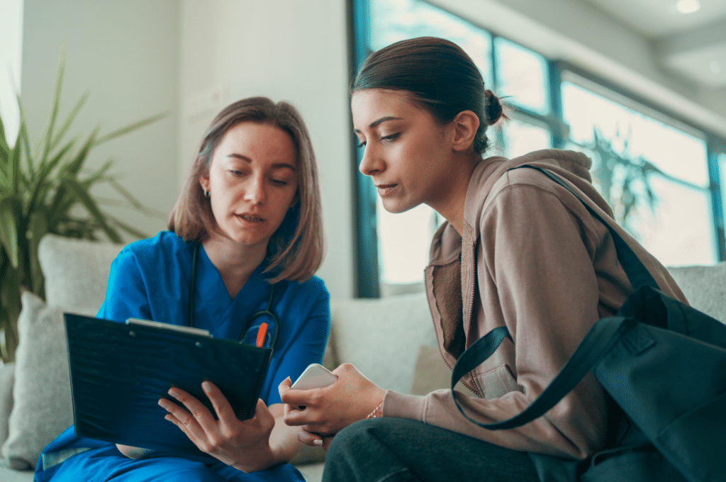 Woman talking to doctor