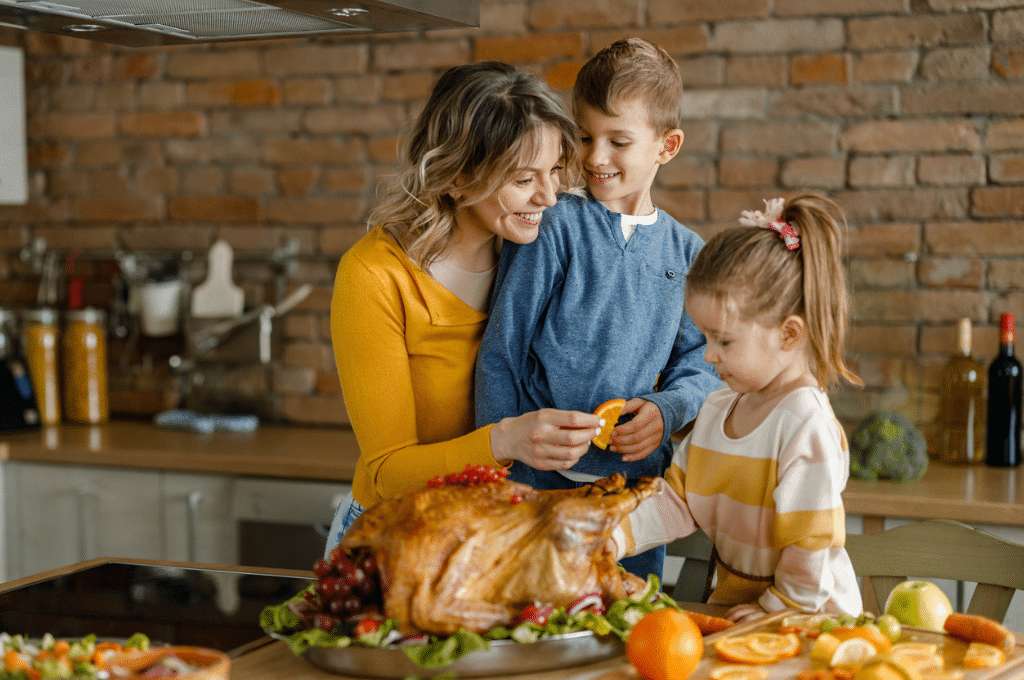 Mom and Children cooking Turkey