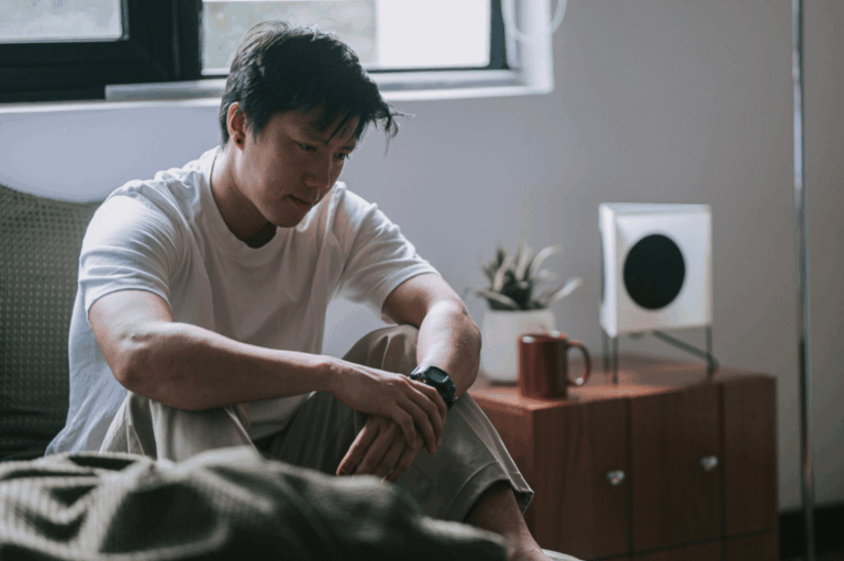 Man sad in bed