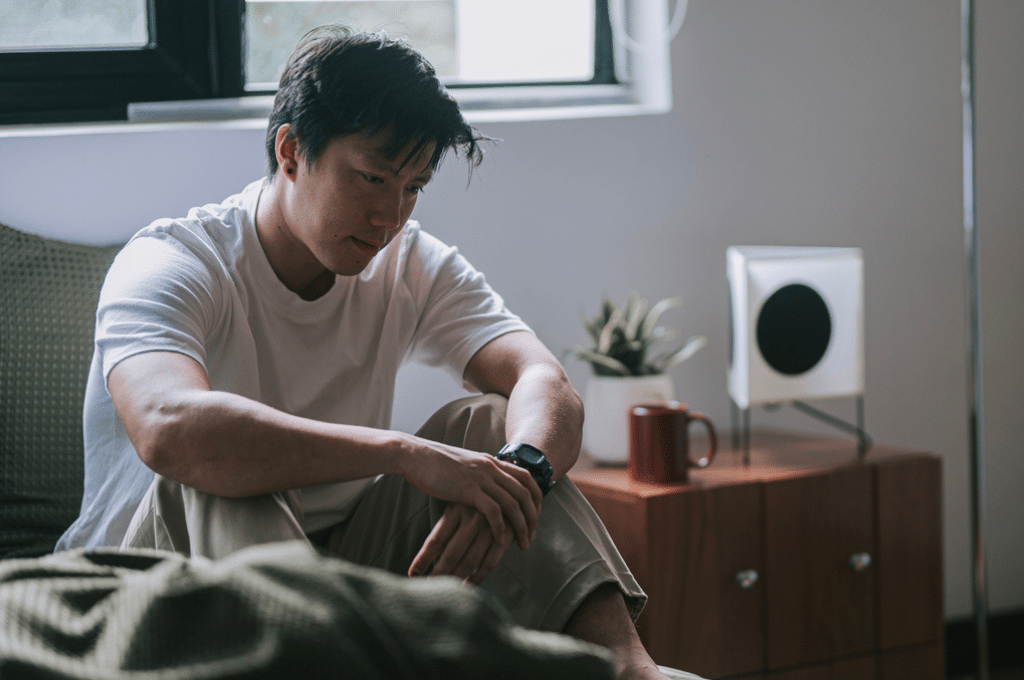 Man sad in bed