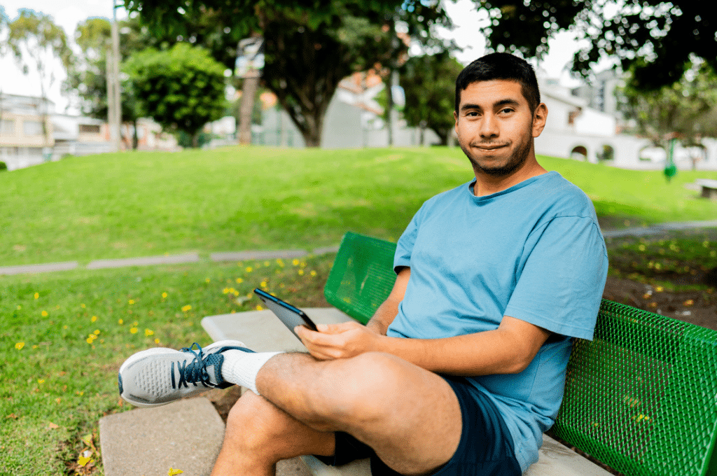 Man outside on a bench