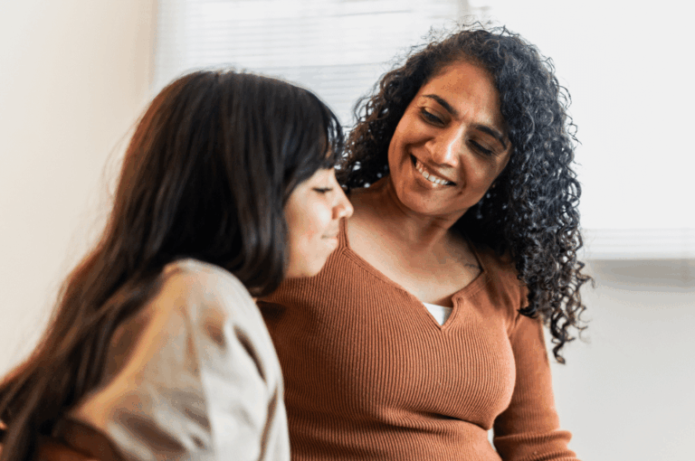 Mother talking to daughter