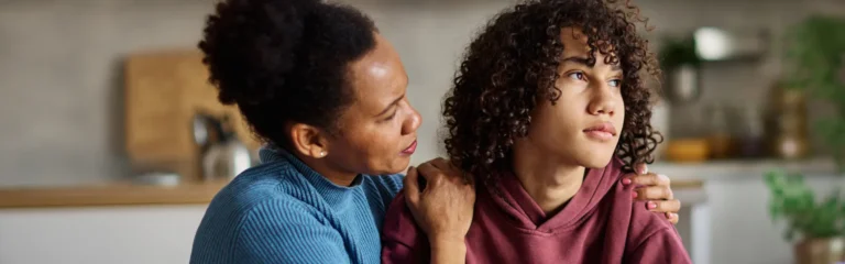 Mother Comforting Teenager