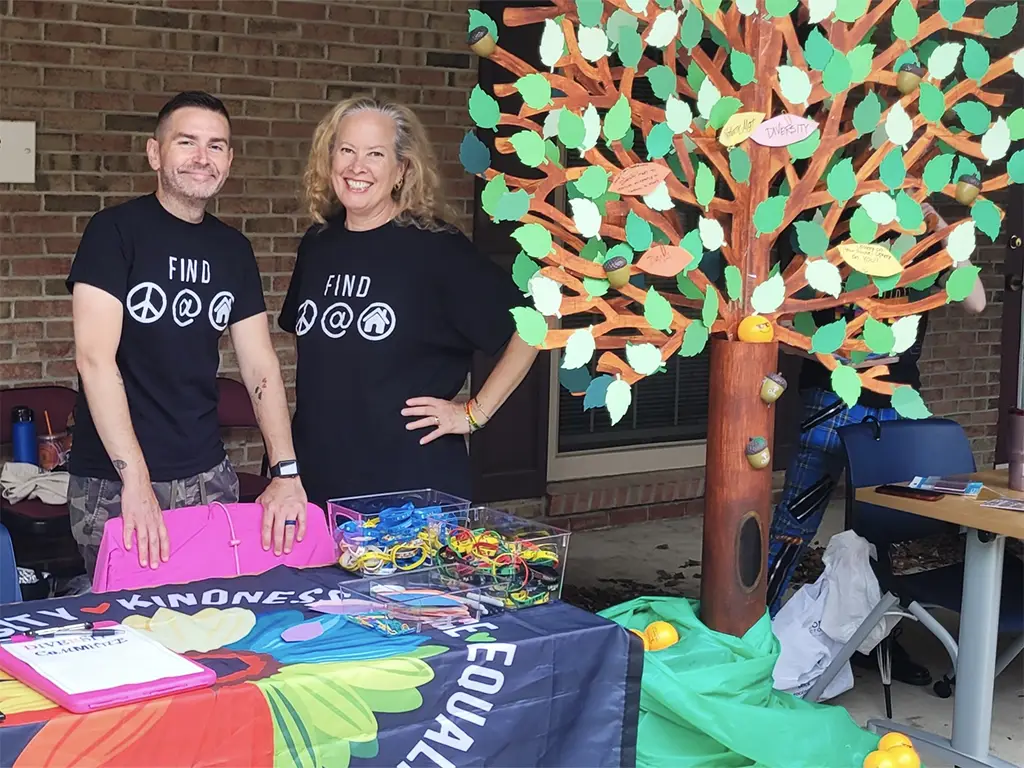 Oaks Employees at a Pride event table