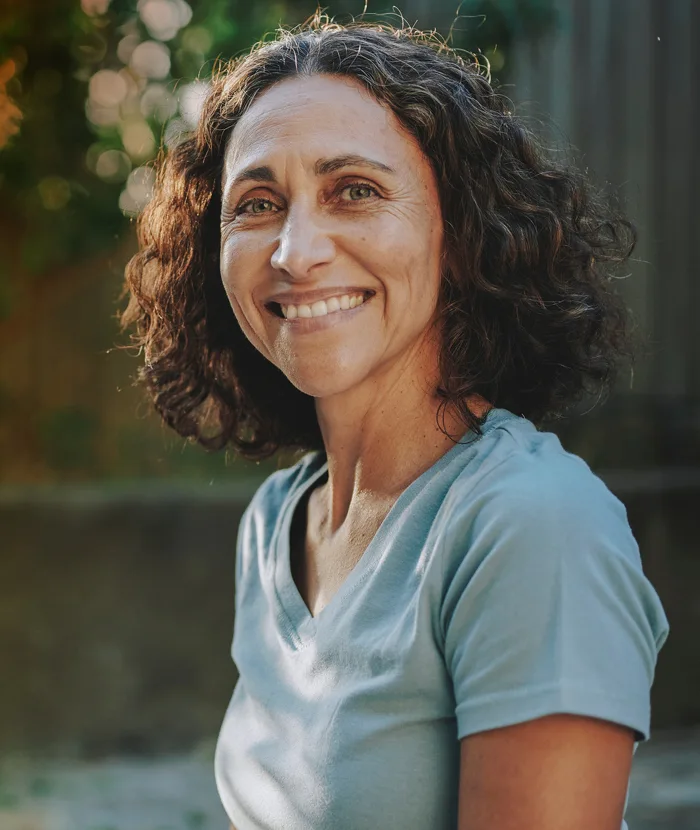 Middle Age Woman outside smiling - What to Expect