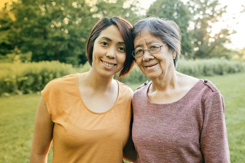 Older Mom and Daughter Smiling